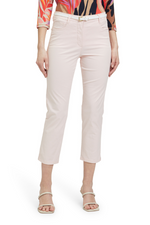 An image of a model wearing the Betty Barclay Slim Fit Trousers in the colour Light Rose.
