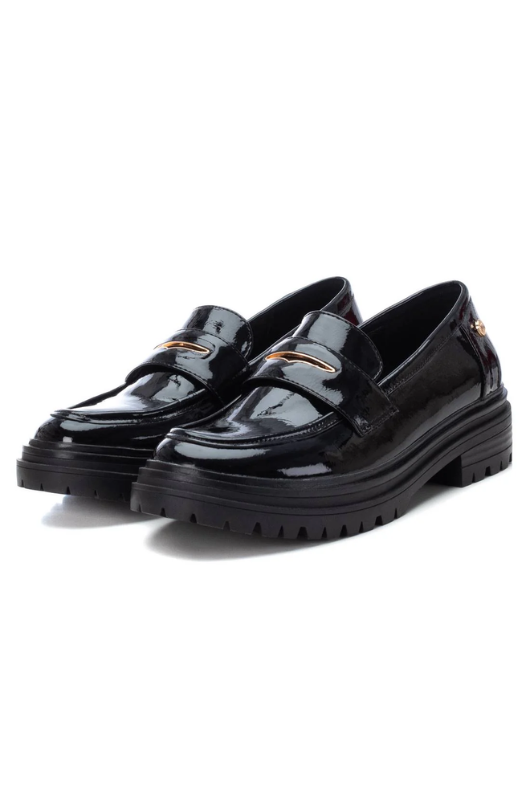Xti Patent Loafer. A black shiny finish loafer with gold hardware and chunky sole.