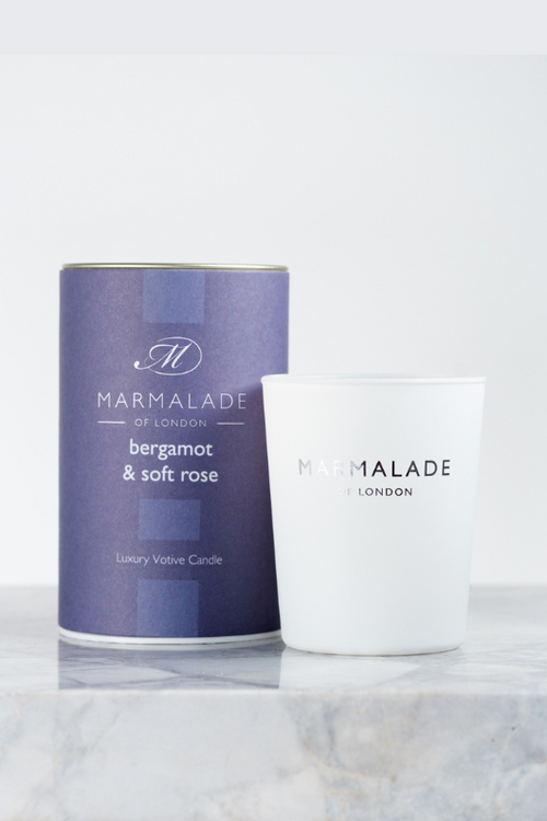 Marmalade of London Luxury Votive Candle - Bergamot & Soft Rose Scent in dark blue packaging.