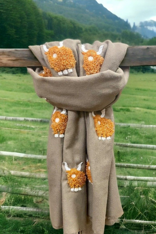An image of the Orchid Designs Brown/Ginger Mohair Highland Cow Beige Scarf.
