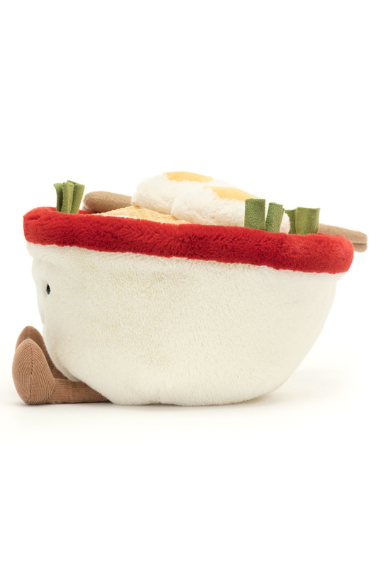 Jellycat Amuseable Ramen. A soft toy bowl of ramen featuring chopsticks, eggs, spring onions, a smiling face, and little legs.