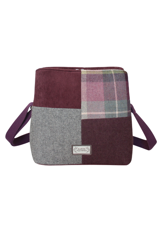 Earth Squared Logan Bag. A crossbody bag with adjustable strap, multiple compartments and magnetic/zip closures. This bag has a patchwork tweed design in the style Aberlady.