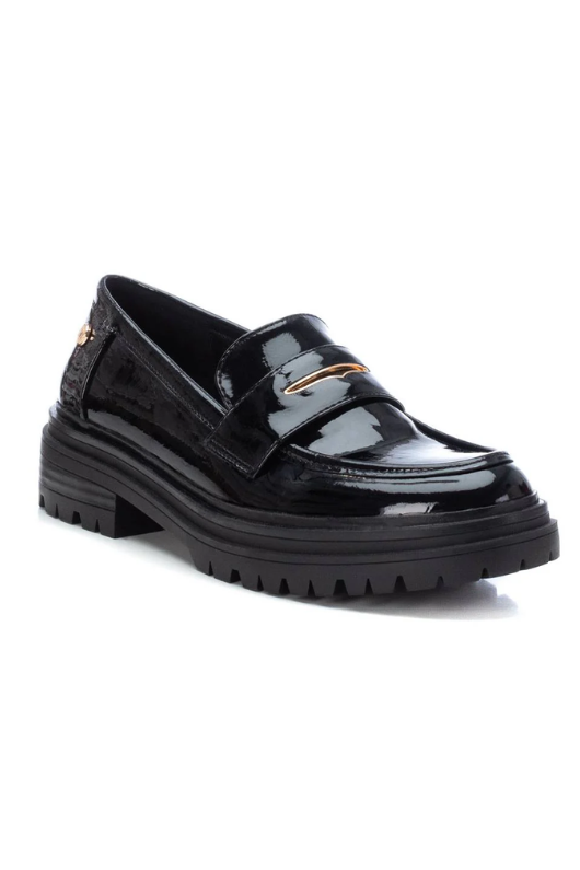 Xti Patent Loafer. A black shiny finish loafer with gold hardware and chunky sole.