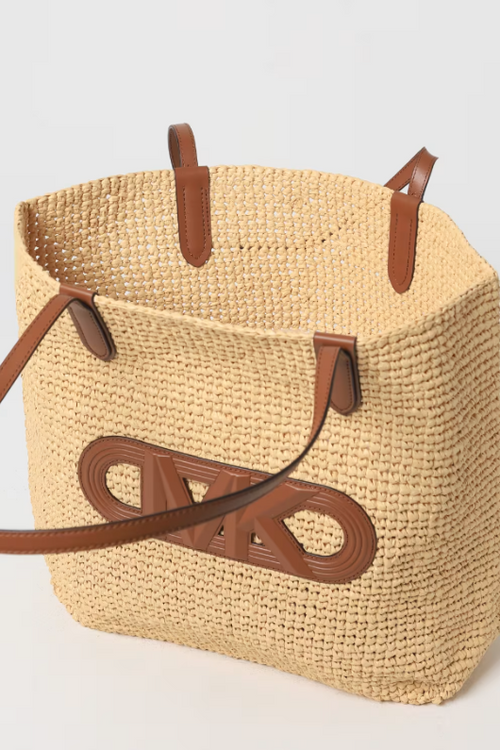 An image of the Michael Kors Eliza XL Crochet Tote Bag in the colour Natural Luggage.
