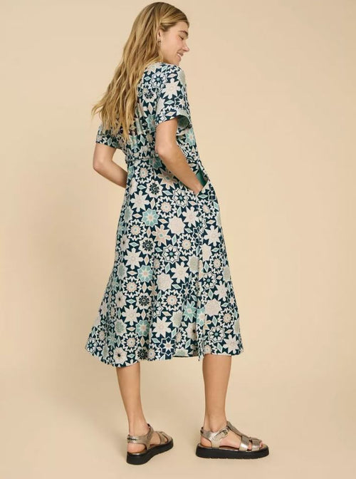White Stuff Ivy Linen Midi Dress. A regular fit, midi length dress with short sleeves and V-neckline in a multicoloured blue bold print.
