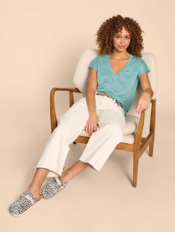 White Stuff Ivy Linen Tee. A relaxed fit, women's t-shirt with short sleeves, a flattering V-neck, and a plain teal design.