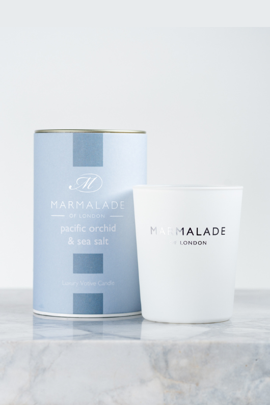 Marmalade of London Luxury Votive Candle - Pacific Orchid & Sea Salt scent in light blue packaging.