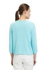 An image of a female model wearing the Betty Barclay Chunky Knit Jumper in the colour Angel Blue.