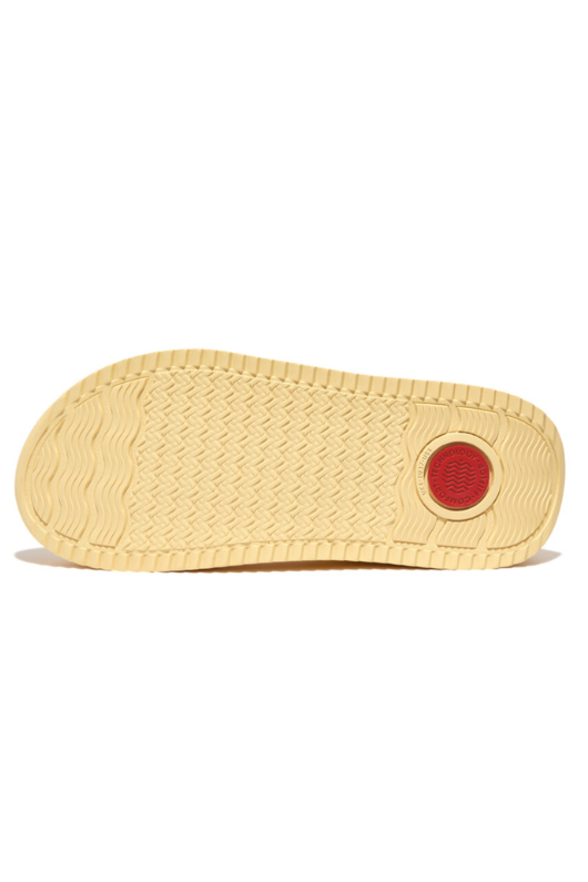 Fitflop Surff Webbing Back Strap Sandals. A pair of yellow chunky sandals with wide strap featuring an arrow print design and microwobbleboard cushioned sole.