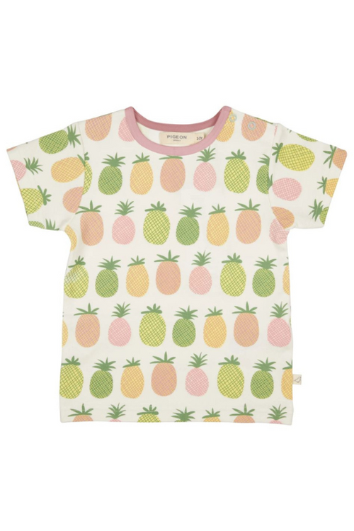 Pigeon Organics Short Sleeve T-Shirt. A short sleeve T-shirt with round neckline, shoulder poppers (up to 3-4y), and pink and green pineapple print.