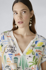 Oui Amalfi Print Top. A casual fit top with short sleeves, V-neck, jersey striped back, and Amalfi themed print on front.