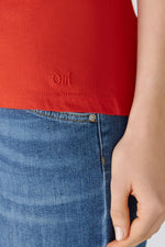 Oui V-Neck Tee Top. A straight shape top with short sleeves and deep V-neck in an orange shade. The Oui logo on the hem adds extra detail.