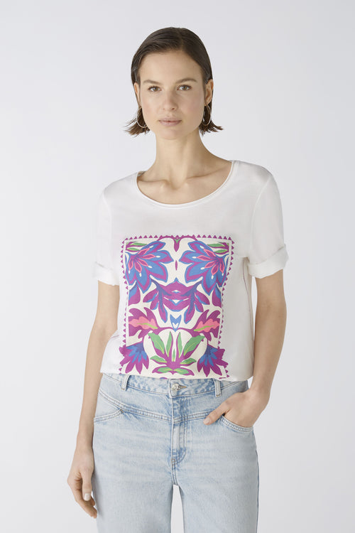 Oui Floral Motif T-Shirt. A casual cut, regular length T-shirt featuring half sleeves, a multicoloured floral motif, and slits and embroidery at the hem.