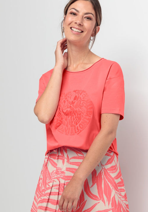 Bianca Dianne Short Sleeve Top. A regular fit, T-shirt style top with short sleeves and round neckline. Features a motif and coral colour.