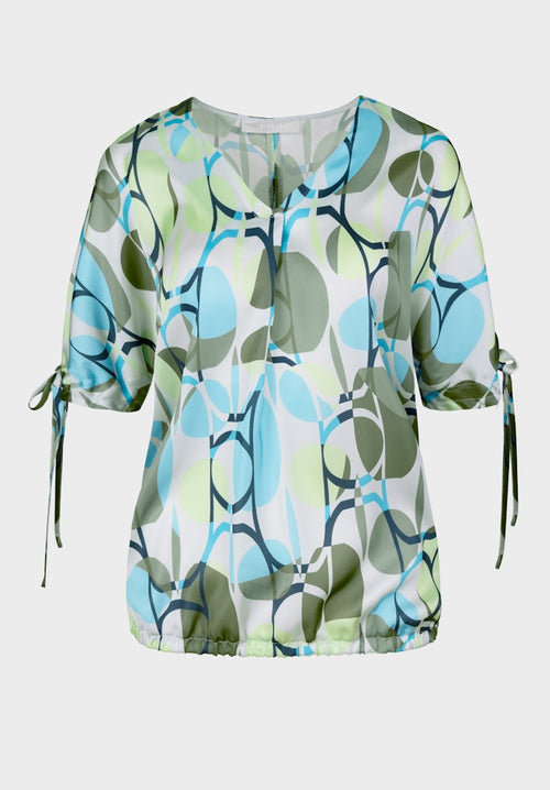 Bianca Shara V-Neck Top. A regular fit polyester top with V-neck and tie-sleeve detail. Features an abstract design in blue and green. 