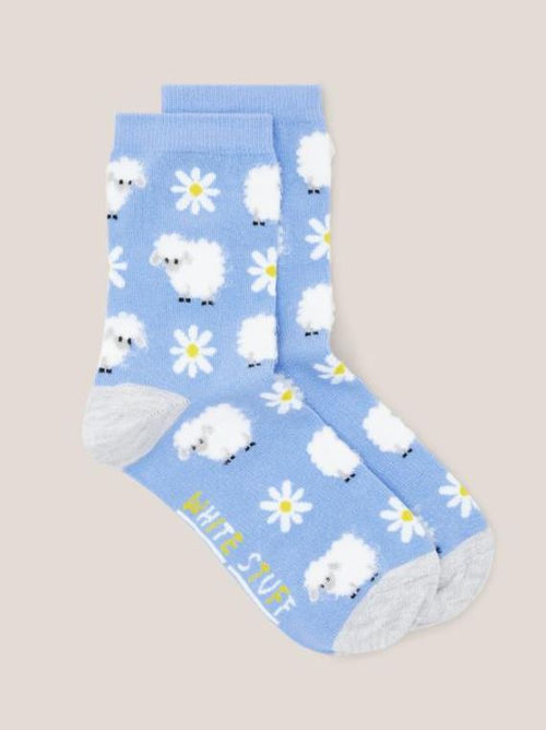 White Stuff Fluffy Sheep Socks. A light blue sock with a fluffy sheep and daisy design all-over.