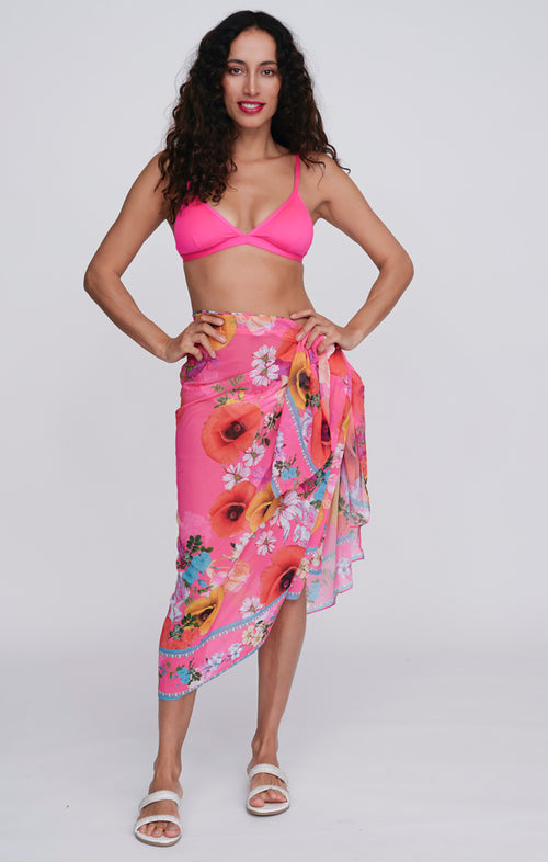 Pia Rossini Copacabana Sarong. A lightweight pink sarong with floral print.