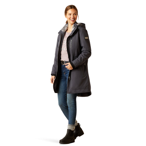 An image of a female model wearing the Ariat Tempest Waterproof Insulated Parka in the colour Ebony.