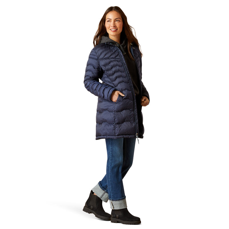 An image of a female model wearing the Ariat Ideal Down Coat in the colour Navy.
