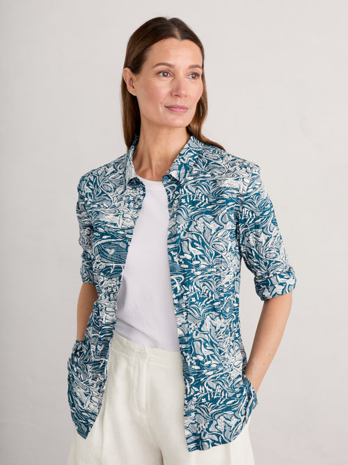 Seasalt Larissa Shirt. A semi-fitted shirt with long sleeves, collared neckline, button fastening, and bold blue/green print.