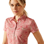 Ariat Motif Short Sleeve Polo. A short sleeve, collared polo with button fastenings and pink horse print.