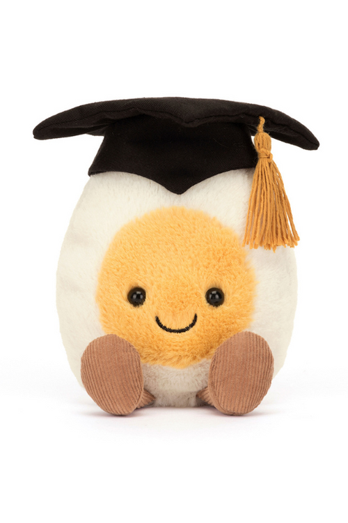 Jellycat Amuseable Boiled Egg Graduation. A soft toy egg with mortarboard and golden tassel.