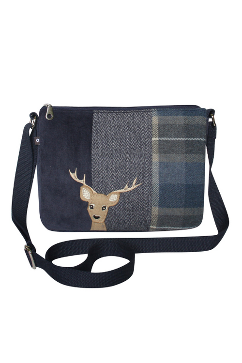 Earth Squared Applique Messenger Bag. A crossbody bag with zip closure and tweed design featuring a deer applique.