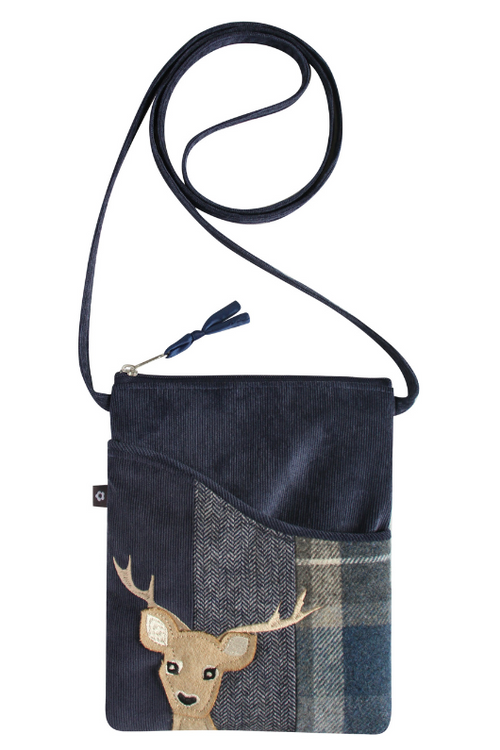 Earth Squared Slingback Applique. A crossbody bag with zip closure, tweed design, and deer applique.