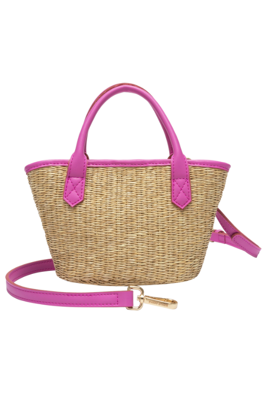 Every Other Straw Rattan Grab Bag. A small raffia bag with pink faux leather details, top handles, crossbody strap, and fully lined interior with zip pocket.