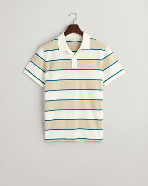 Gant Stripe Pique Polo. A regular fit polo with short sleeves, collared neckline and logo embroidery. Features a striped print in the colour Silky Beige.