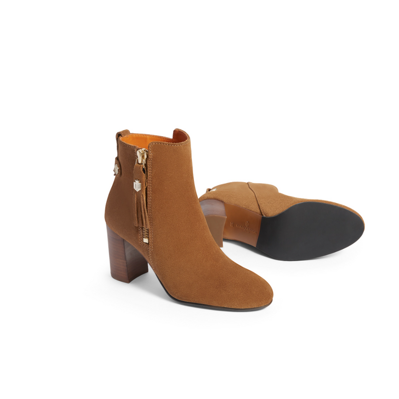 Fairfax & Favor Oakham Suede Ankle boot. A tan boot with heel, zip tassel, and logo shield detail.