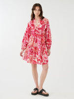 Dea Kudibal Rope Belt Dress. A short length dress with balloon sleeves, belt, and pink and white floral print.