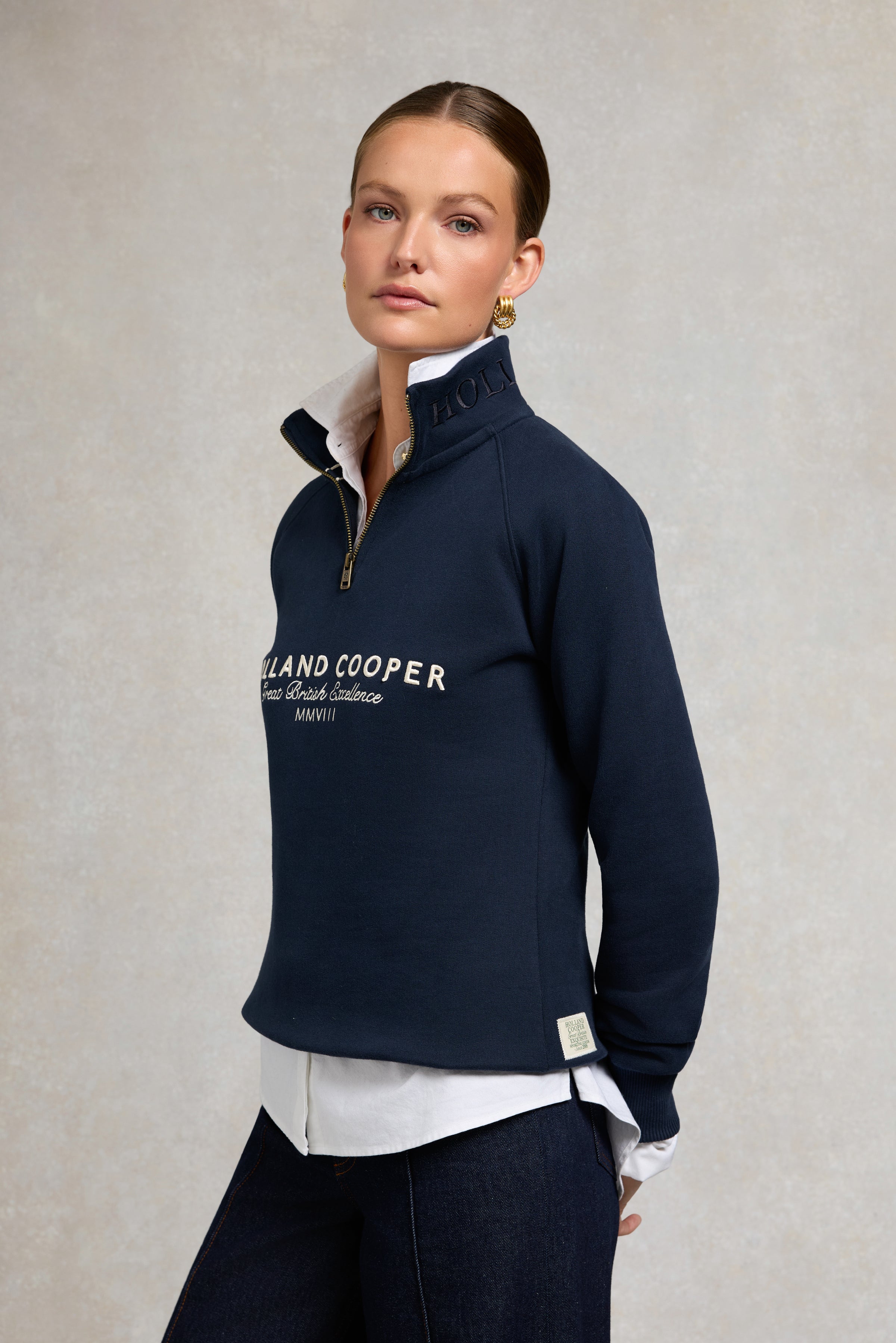 An image of the Holland Cooper Sporting Goods Zip Henley
