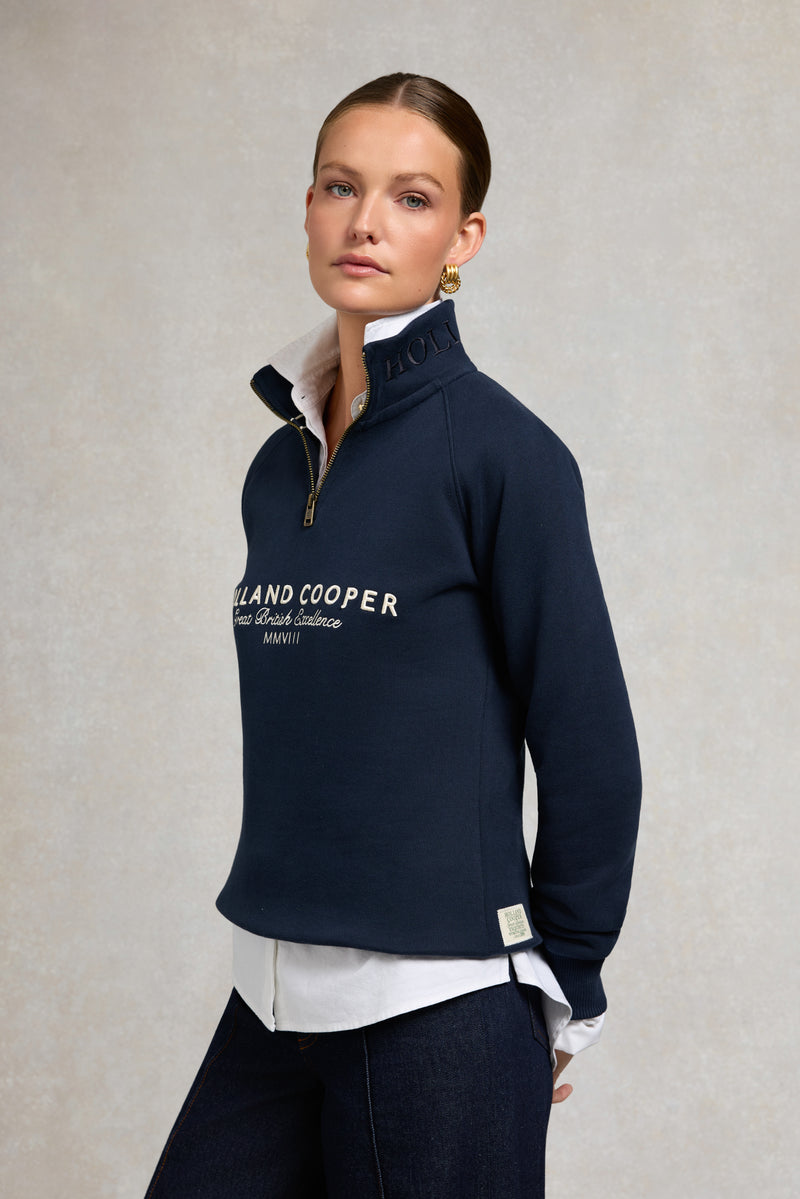 An image of the Holland Cooper Sporting Goods Zip Henley