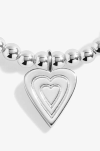 An image of the Joma Jewellery Christmas Cracker 'With Love' Bracelet