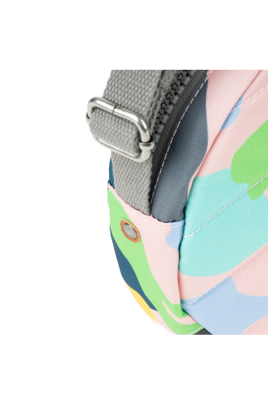 An image of the Roka London Paddington Mellow Camo Recycled Canvas Crossbody Shoulder Bag.