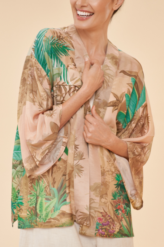 Powder Kimono Jacket. A hip-length, open style jacket with a beige floral print