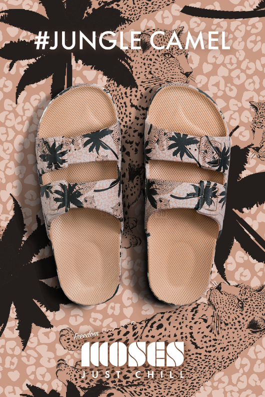 An image of the Freedom Moses Slides in the colour Jungle Camel. Beige sandals with a tree and jungle print all-over
