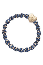 An image of the By Eloise Metallic Gold Heart Elastic Hairband