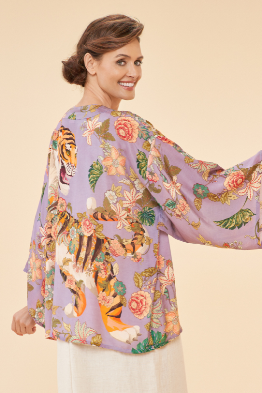 Powder Kimono Jacket. A hip-length, open style jacket with a purple floral print
