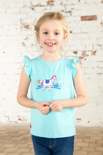 Lighthouse Causeway Swing Tee. A regular fit, kids t-shirt with short ruffle trim sleeves, a crew neck, and a sweet pony design on a light blue background.