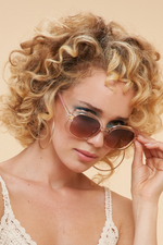 Powder Paige Sunglasses. Large sized sunglasses with a chic rose frame.