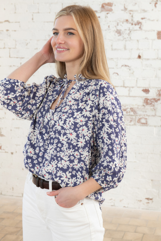 Lighthouse Lola Blouse. A relaxed fit, long sleeve blouse with a tie neck, 3/4 length sleeves and a sweet floral print