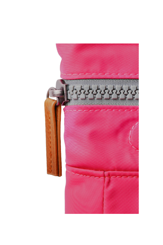 An image of the Roka London Canfield B Rucksack in the colour Sparkling Cosmo.