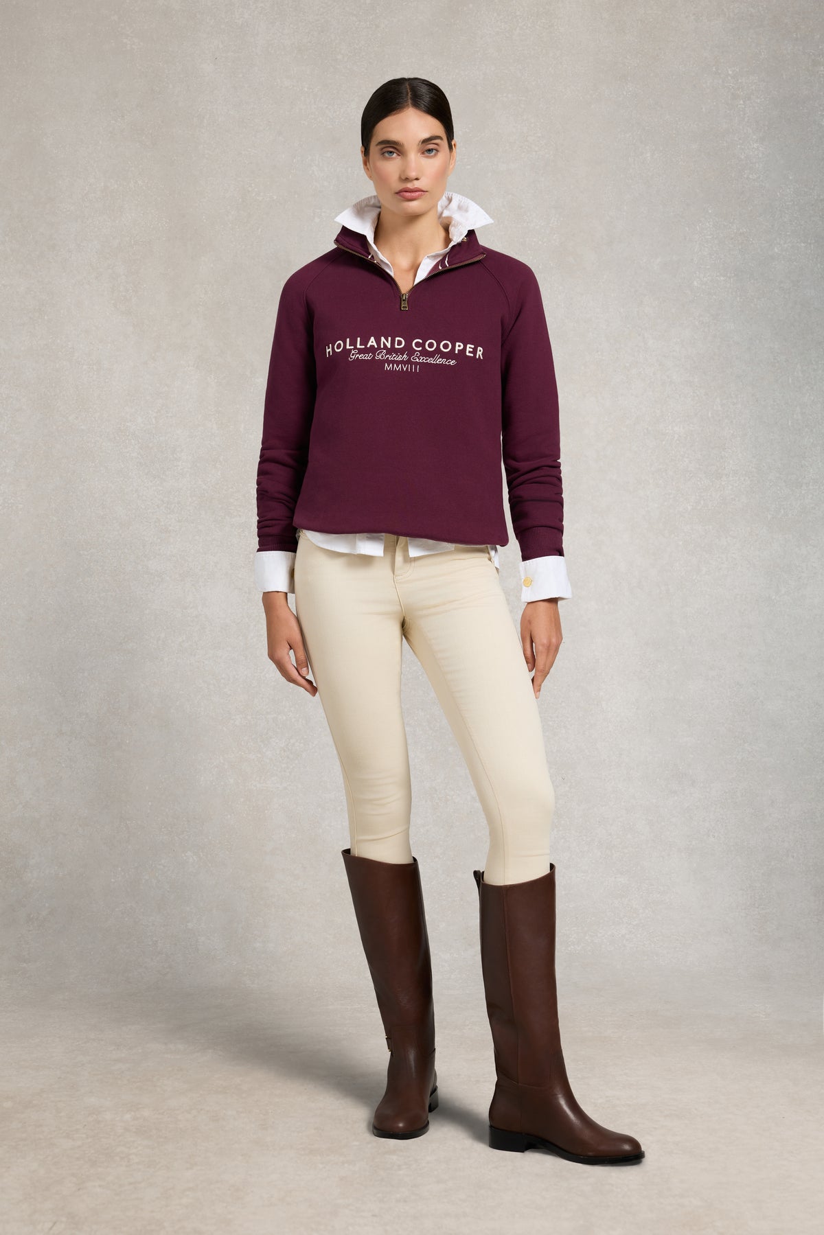 An image of the Holland Cooper Sporting Goods Zip Henley