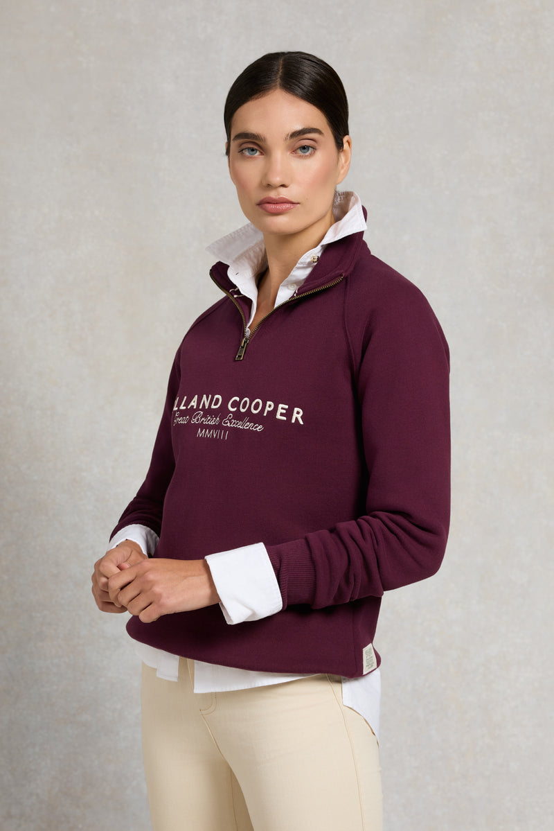 An image of the Holland Cooper Sporting Goods Zip Henley