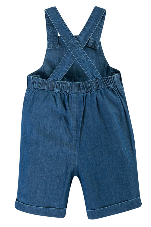 Frugi Carnkie Dungarees. A pair of blue denim dungarees with adjustable shoulder straps, elasticated waistband, and applique on the front pocket.