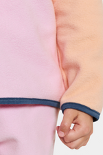 Didriksons Monte 3 Button Fleece. A girls mid-layer sweater in a pink and orange design and a button placket, elastic binding on the sleeve and a thermal, microfleece finish.