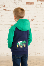 Lighthouse Jackson Full Zip Hoodie. A boys zip-up hoodie with waist pockets, a soft jersey lined hood, and a a navy torso with a tractor piqué on the chest and green sleeves.