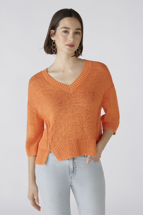 Oui Jumper. An orange, relaxed fit jumper with V-neck, 3/4 length sleeves, and slightly cropped length. 